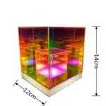 3D pyramid night light with RGB color modes on a bedside table
