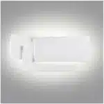 Modern wall sconce with three-layer stacked LED design in a living room