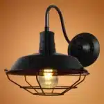 Vintage wall sconce with industrial iron cage and gooseneck arm