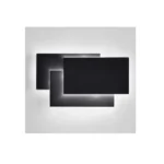 Modern wall sconce with three-layer stacked LED design in a living room