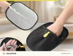 Pet hair remover glove removing fur from a couch