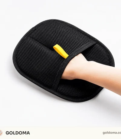 Pet hair remover glove removing fur from a couch